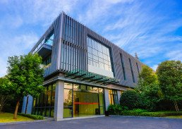 A modern commercial building construction in glass and steel