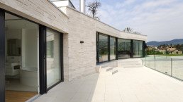 A single storey modern house construction with stone cladding